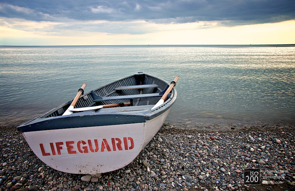 Lifeguard boat on the beach facing towards Lake Ontario at the Beaches, Toronto, Canada
