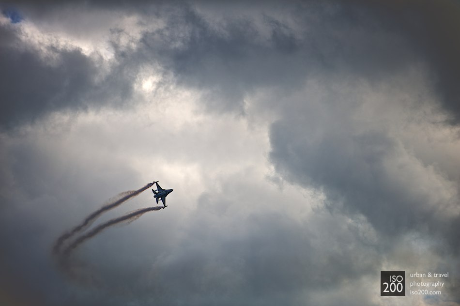 Michel ‘Mitch’ Beulen’s F16 of 349 (F) squadron of the  Belgian Air Component’s Solo Display Team is busy making his own clouds during the 2010 Leuchars Air Show.