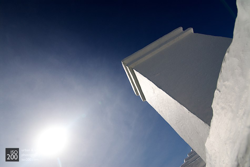 A typical Bermudian chimney against a blue sky.