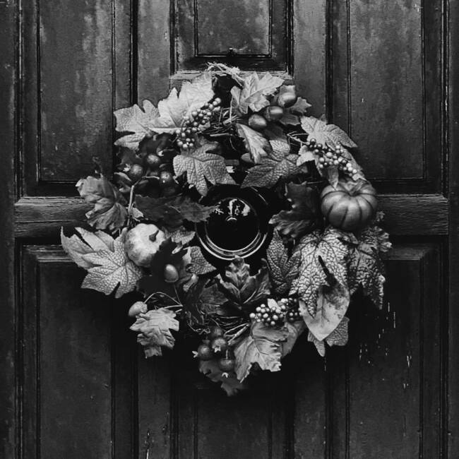 

Black and white halloween door wreath.

